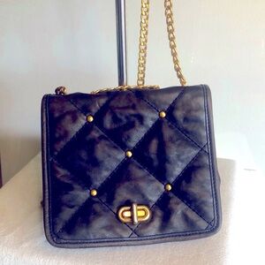 REBECCA MINKOFF dark blue quilted gold studded crossbody bag. Gold heavy chain.